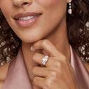 Round Three Stone Engagement Ring