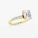 Elongated Cushion Graduated Side Stone Stone Engagement Ring