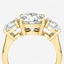 Round Three Stone Engagement Ring