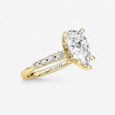 Pear Graduated Side Stone Engagement Ring