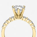 Pear Graduated Side Stone Engagement Ring