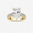 Pear Split Prong Side Stone Engagement Ring