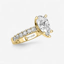 Pear Split Prong Side Stone Engagement Ring