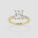 Elongated Cushion Graduated Side Stone Stone Engagement Ring