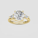 Round with Pear Side Stones Engagement Ring
