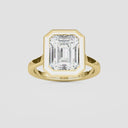 Emerald Bezel Set Solitaire Engagement Ring
