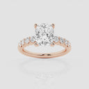Elongated Cushion Graduated Side Stone Stone Engagement Ring