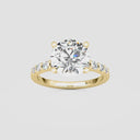 Round Graduated Side Stone Engagement Ring
