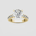 Round Split Prong Side Stone Engagement Ring