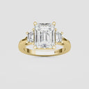 Emerald with Trapezoid Side Stones Engagement Ring